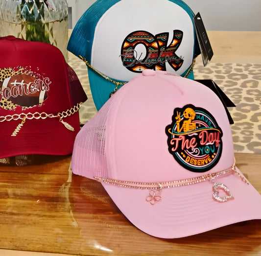 “Have the Day You Deserve” Trucker Hat